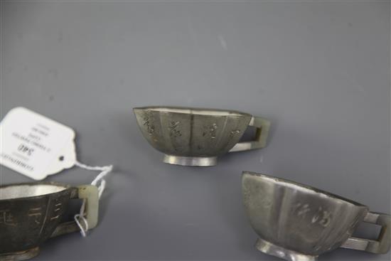 Three Chinese Yixing pewter and jade mounted cups, Daoguang period (1821-50), w. 8cm-8.6cm